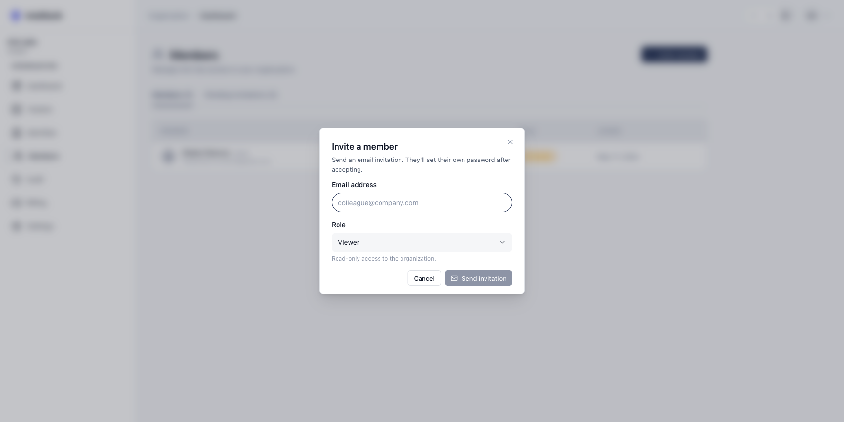The Invite-a-member dialog with email address and role fields