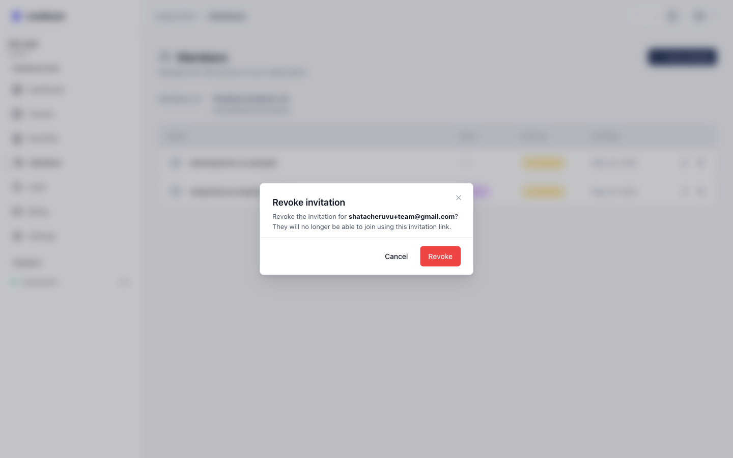 Revoke invitation confirm dialog naming the email address and warning that the link will stop working
